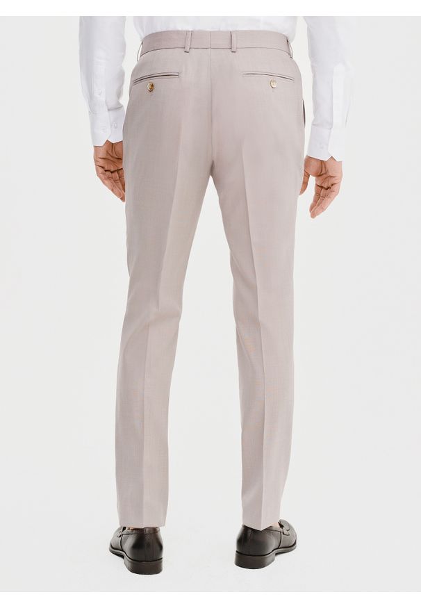 Pako Lorente - PAKO LORENTE – Spodnie garniturowe w kolorze różowym. Okazja: na spotkanie biznesowe. Kolor: różowy. Materiał: wełna, poliester. Styl: elegancki, biznesowy