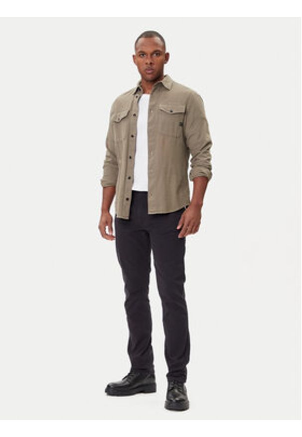 Wrangler Jeansy Larston 112371641 Czarny Tapered Fit. Kolor: czarny