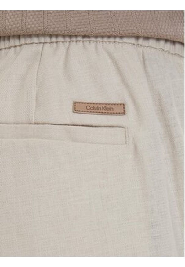 Calvin Klein Spodnie materiałowe LV04LF619G Beżowy jasny Straight Fit. Kolor: beżowy. Materiał: bawełna