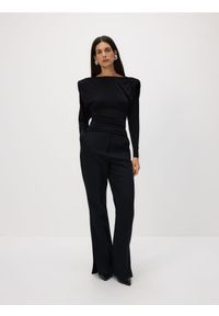 Reserved - Spodnie z rozcięciami long leg - czarny. Kolor: czarny. Materiał: tkanina, wiskoza