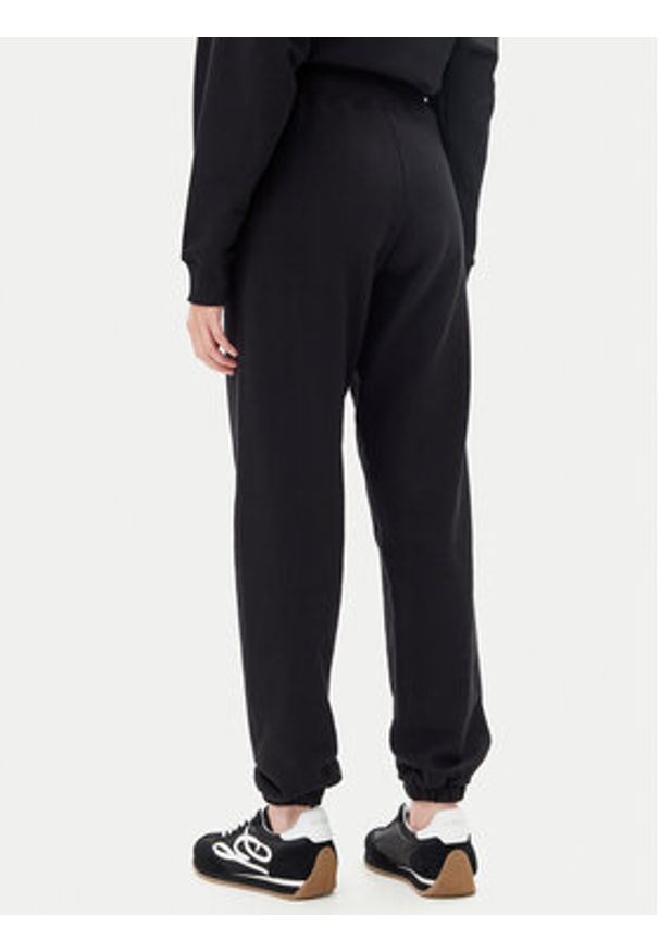 Guess Spodnie dresowe V5YB17 KCRP0 Czarny Regular Fit. Kolor: czarny. Materiał: bawełna
