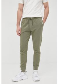 Pepe Jeans spodnie bawełniane David męskie kolor zielony z nadrukiem. Kolor: zielony. Materiał: bawełna. Wzór: nadruk