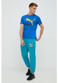 Puma spodnie dresowe bawełniane męskie kolor turkusowy z aplikacją. Kolor: turkusowy. Materiał: bawełna, dresówka. Wzór: aplikacja #2