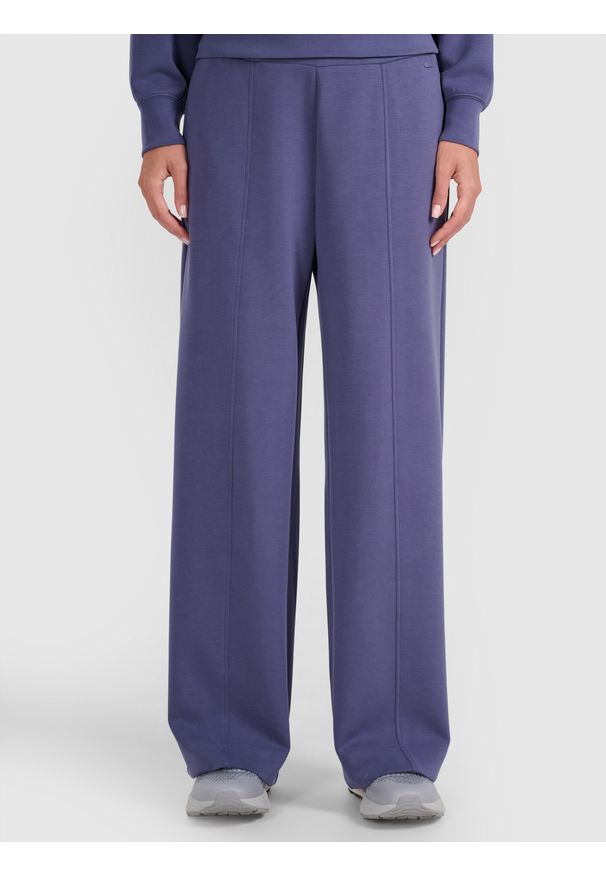 4f - 4F Spodnie dresowe z szerokimi nogawkami z modalem damskie - granatowe XL. Kolor: niebieski. Materiał: dresówka. Wzór: gładki, ze splotem. Sport: fitness