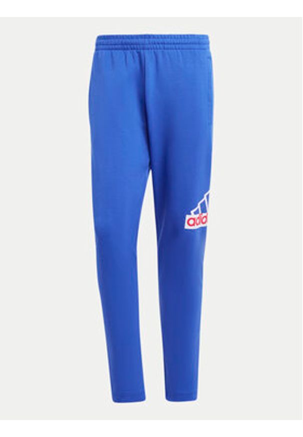 Adidas - adidas Spodnie dresowe Future Icons Badge of Sport IS9594 Niebieski Regular Fit. Kolor: niebieski. Materiał: bawełna