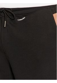 Calvin Klein Spodnie dresowe K10K113654 Czarny Regular Fit. Kolor: czarny. Materiał: bawełna #4