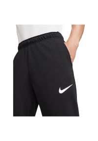 Spodnie treningowe męskie Nike Dri-Fit CZ6379. Materiał: materiał, włókno, dzianina, skóra, bawełna, syntetyk, poliester. Technologia: Dri-Fit (Nike). Sport: fitness #4