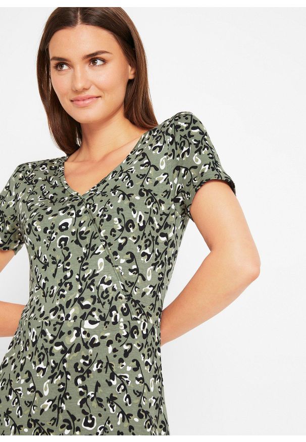 bonprix - Sukienka T-shirtowa z lejącego materiału z wiskozą. Typ kołnierza: dekolt kopertowy. Kolor: zielony. Materiał: materiał, wiskoza. Typ sukienki: kopertowe
