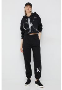 Calvin Klein Jeans spodnie dresowe damskie kolor czarny z nadrukiem. Kolor: czarny. Materiał: dresówka. Wzór: nadruk #4