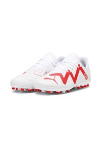 Buty piłkarskie dla dzieci Puma Future Play Mg Jr. Zapięcie: sznurówki. Kolor: biały, czerwony, wielokolorowy. Materiał: guma, syntetyk, materiał. Szerokość cholewki: normalna. Sport: piłka nożna