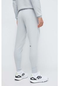 Adidas - adidas spodnie dresowe Z.N.E kolor zielony gładkie. Kolor: zielony. Materiał: dresówka. Wzór: gładki. Sport: fitness #3