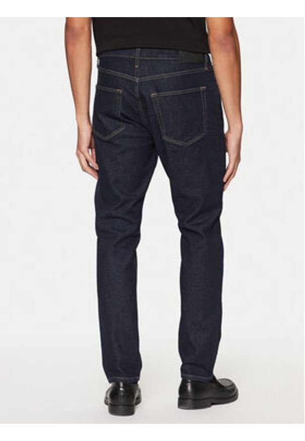 Calvin Klein Jeansy K10K113983 Granatowy Tapered Fit. Kolor: niebieski