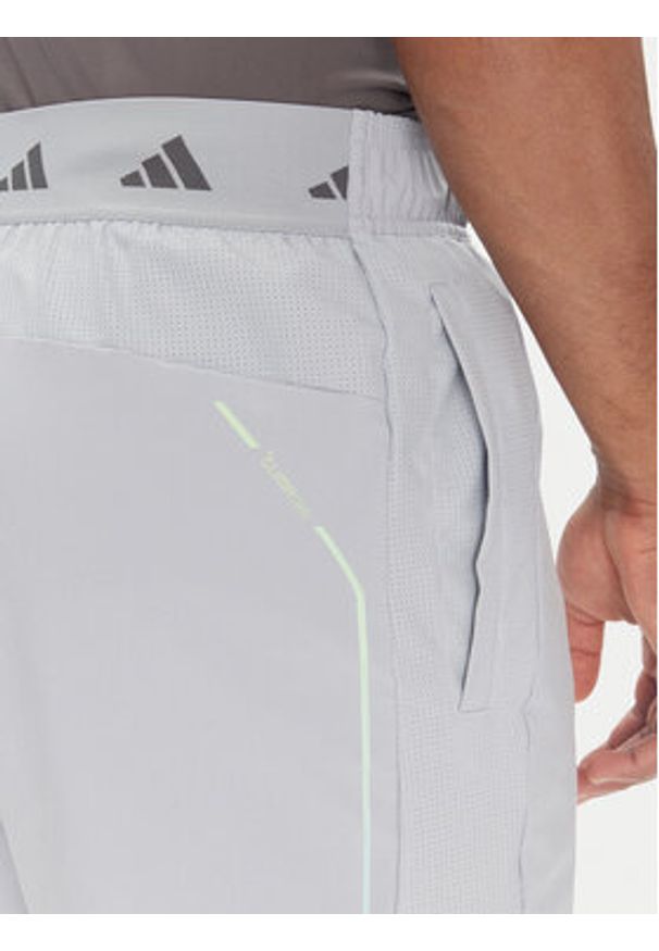 Adidas - adidas Szorty sportowe Tech JM4178 Szary Regular Fit. Kolor: szary. Materiał: syntetyk
