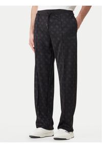 Guess Spodnie dresowe Z6GB03 K2850 Czarny Regular Fit. Kolor: czarny. Materiał: syntetyk #1
