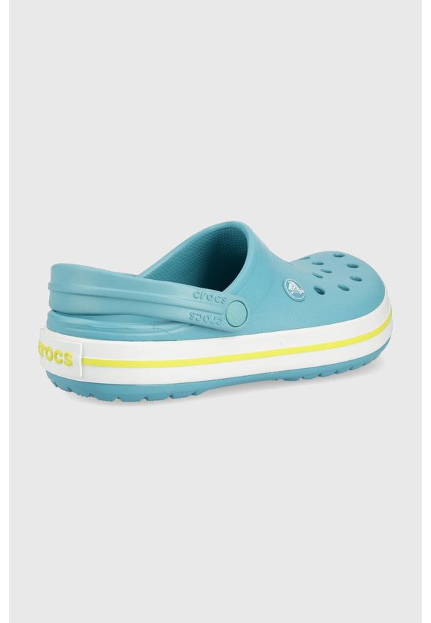 Crocs klapki kolor turkusowy. Kolor: turkusowy. Materiał: materiał. Wzór: gładki