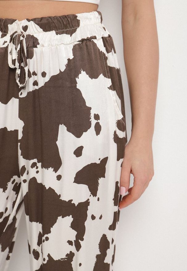 Born2be - Brązowe Wiskozowe Spodnie o Szerokim Kroju z Wysokim Stanem w Krowie Łaty Nelamara. Okazja: na co dzień. Stan: podwyższony. Kolor: brązowy. Materiał: wiskoza. Styl: casual, elegancki