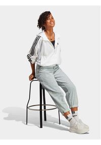 Adidas - adidas Wiatrówka Essentials 3-Stripes IC0560 Biały Loose Fit. Kolor: biały. Materiał: syntetyk #7