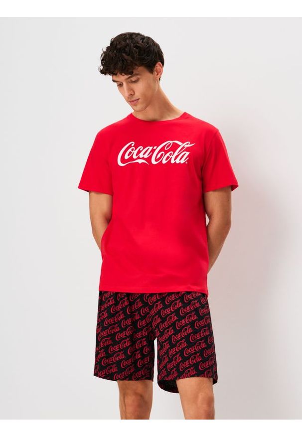 Sinsay - Bawełniana piżama dwuczęściowa Coca-Cola - wielobarwny. Materiał: bawełna
