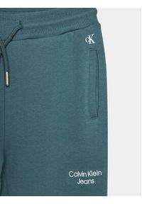 Calvin Klein Jeans Spodnie dresowe Stack Logo IB0IB01282 Niebieski Regular Fit. Kolor: niebieski. Materiał: bawełna #3