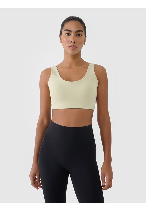 4f - 4F Biustonosz treningowy ze średnim wsparciem - zielony L. Kolor: zielony. Materiał: dzianina, materiał, syntetyk, włókno, jersey, guma, elastan. Wzór: jednolity, gładki, ze splotem. Sport: bieganie, kolarstwo, fitness