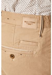 Marc O'Polo - Spodnie. Kolor: beżowy. Materiał: tkanina. Wzór: gładki