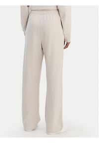 DKNY Sport Spodnie dresowe DP6P3795 Beżowy Regular Fit. Kolor: beżowy. Materiał: bawełna #4