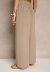 Renee - Ciemnobeżowe Szerokie Spodnie High Waist z Wiązaniem w Talii Reivaritta. Okazja: do pracy, na spotkanie biznesowe, na co dzień. Stan: podwyższony. Kolor: beżowy. Styl: casual, elegancki, biznesowy