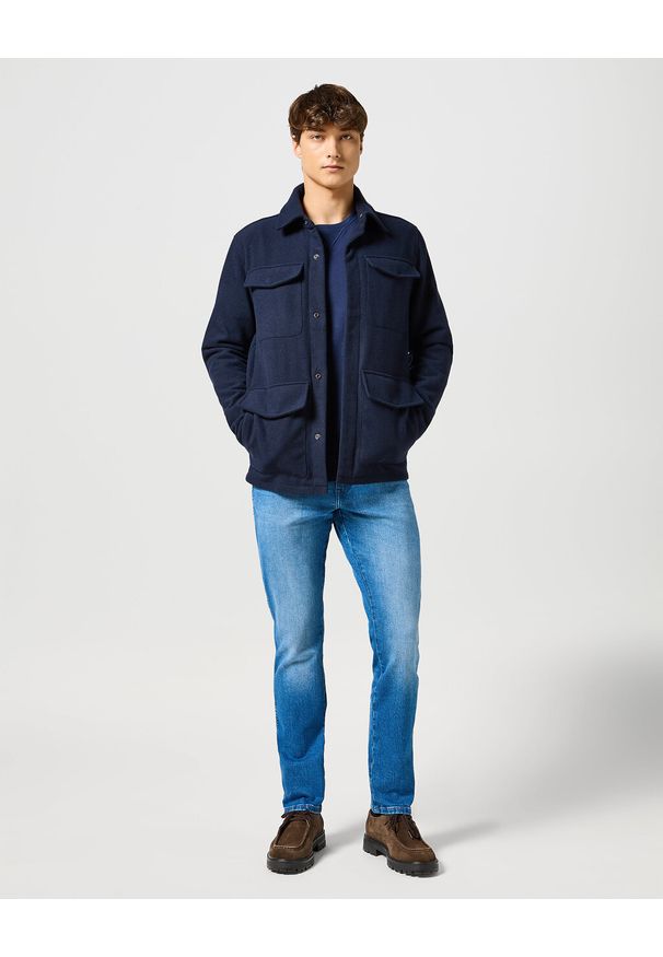 Wrangler - WRANGLER TEXAS SLIM MĘSKIE SPODNIE JEANSOWE JEANSY DŻINSY PRAIRIE BLUE 112356813 W12S017441. Okazja: na co dzień. Stan: podwyższony. Styl: klasyczny, casual, vintage, elegancki