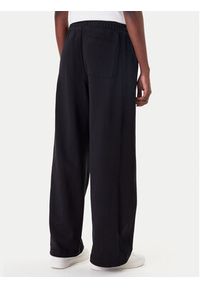 Calvin Klein Jeans Spodnie dresowe LV047C249G Czarny Regular Fit. Kolor: czarny. Materiał: bawełna