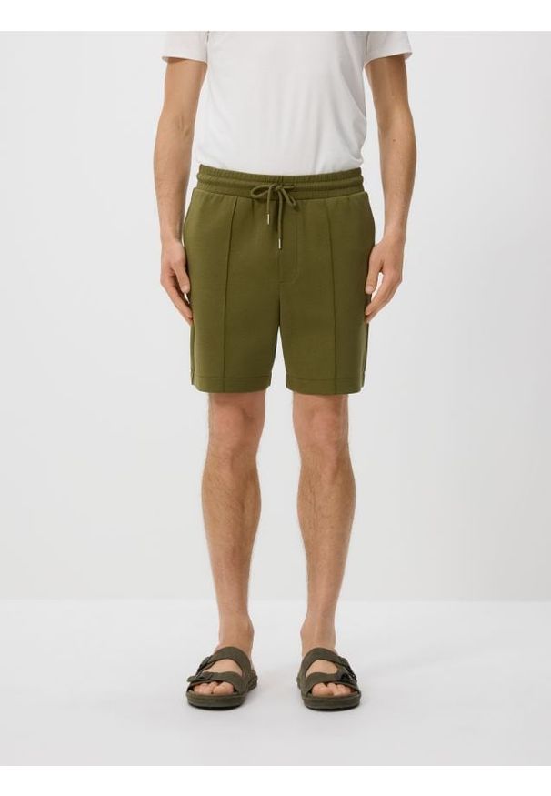 Reserved - Szorty comfort z przeszyciami - jasny zielony. Kolor: zielony. Materiał: bawełna, dzianina
