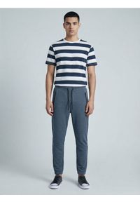 Sinsay - Spodnie dresowe jogger - granatowy. Kolor: niebieski. Materiał: dresówka