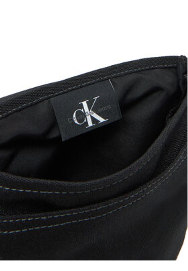 Calvin Klein Jeans Saszetka Workwear Ut Flap Reporter 18 LV04G3025G Czarny. Kolor: czarny. Materiał: materiał