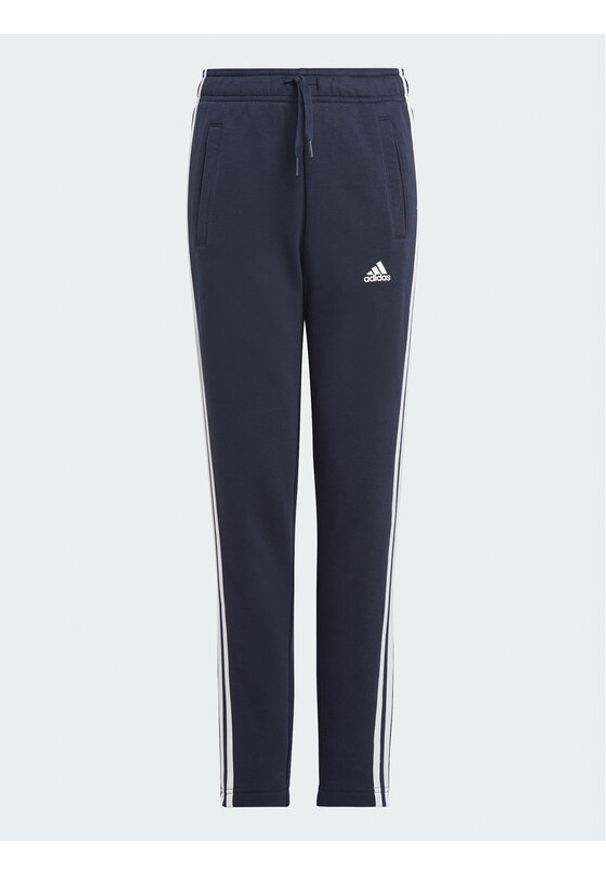 Adidas - adidas Spodnie dresowe Essentials 3-Stripes IC6128 Granatowy Slim Fit. Kolor: niebieski. Materiał: bawełna