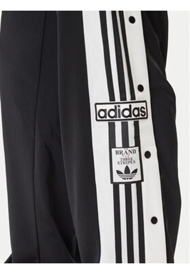 Adidas - adidas Spodnie dresowe Adibreak JP3760 Czarny Regular Fit. Kolor: czarny. Materiał: syntetyk