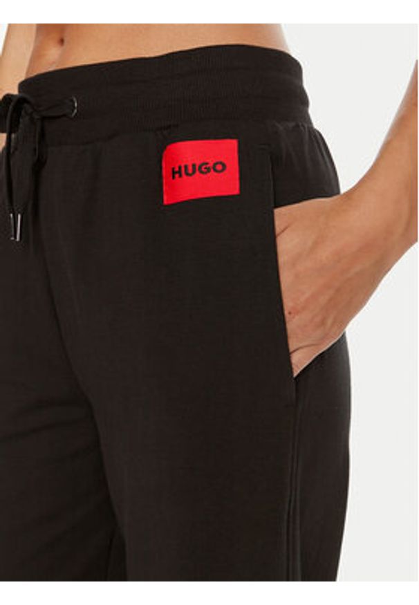 Hugo Spodnie dresowe Talua 50508694 Czarny Relaxed Fit. Kolor: czarny. Materiał: bawełna