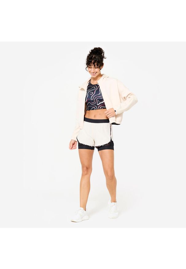DOMYOS - Koszulka fitness damska Domyos bez rękawów crop top. Kolor: czarny. Materiał: materiał, elastan, poliester. Długość rękawa: bez rękawów. Sport: fitness