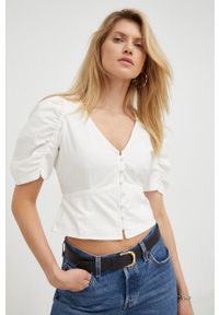 Levi's® - Levi's bluzka bawełniana damska kolor biały gładka. Okazja: na spotkanie biznesowe, na co dzień. Kolor: biały. Materiał: bawełna. Długość rękawa: krótki rękaw. Długość: krótkie. Wzór: gładki. Styl: casual, biznesowy