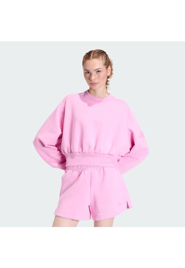 Adidas - adidas Bluza Soft Lux KA7016 Różowy Loose Fit. Kolor: różowy. Materiał: syntetyk