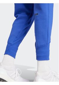 Adidas - adidas Spodnie dresowe Z.N.E. IS3914 Niebieski Regular Fit. Kolor: niebieski. Materiał: bawełna, syntetyk #6