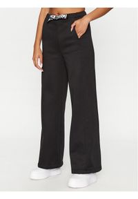 Calvin Klein Jeans Spodnie dresowe J20J221916 Czarny Relaxed Fit. Kolor: czarny. Materiał: dresówka, syntetyk