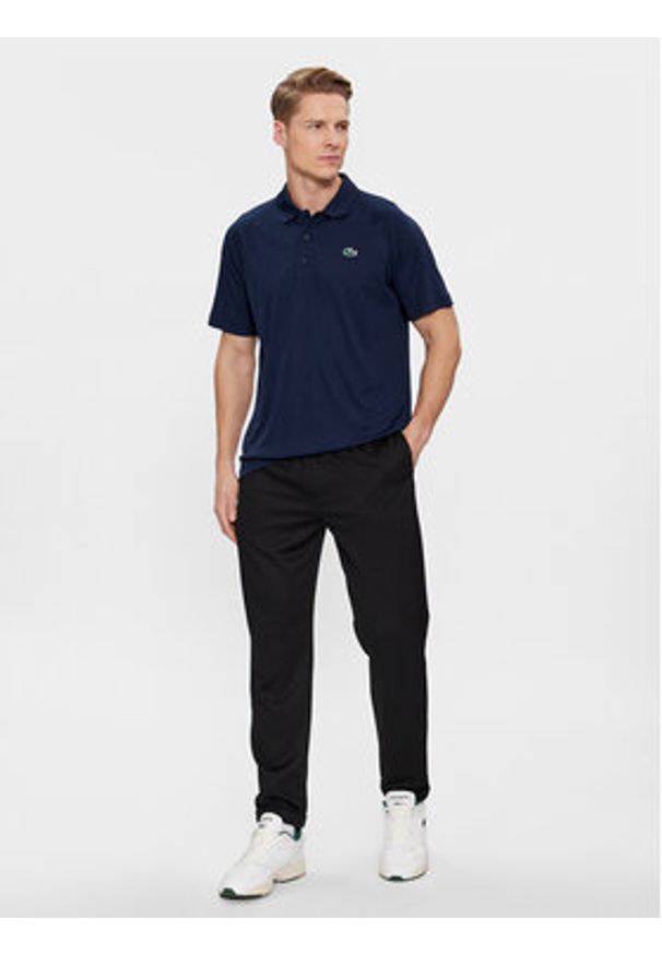 Lacoste Polo DH3201 Granatowy Regular Fit. Typ kołnierza: polo. Kolor: niebieski. Materiał: syntetyk