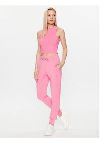 Guess Spodnie dresowe V2YB18 K7UW2 Różowy Reglan Fit. Kolor: różowy. Materiał: dresówka, wiskoza