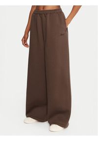 Reebok Spodnie dresowe Reebok X Ewa Chodakowska RK25306CCW Brązowy Regular Fit. Kolor: brązowy. Materiał: bawełna #1