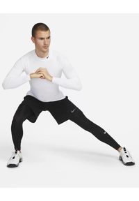 Legginsy sportowe męskie Nike. Kolor: czarny. Materiał: syntetyk, materiał