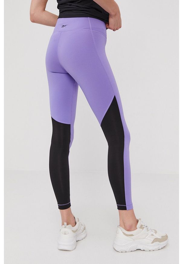 Reebok - Legginsy. Stan: podwyższony. Kolor: fioletowy. Materiał: skóra