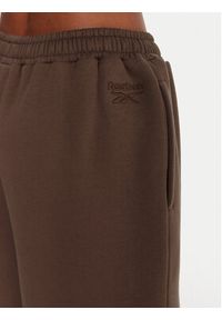 Reebok Spodnie dresowe Reebok X Ewa Chodakowska RK25306CCW Brązowy Regular Fit. Kolor: brązowy. Materiał: bawełna