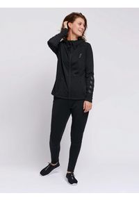 Bluza fitness damska Hummel zip Selby. Typ kołnierza: kaptur. Kolor: czarny. Materiał: jersey, poliester, materiał. Sport: fitness