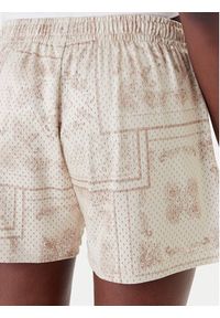 Karl Kani Szorty sportowe Signature Mesh Mini PD00005437 Beżowy Regular Fit. Kolor: beżowy. Materiał: syntetyk