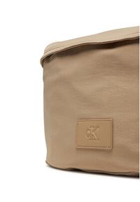 Calvin Klein Jeans Saszetka nerka Metro Oversized Waistbag Ny LV04G3088G Beżowy. Kolor: beżowy. Materiał: materiał