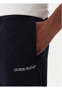 Guess Jeans Spodnie dresowe M6RB70 KCPR1 Granatowy Regular Fit. Kolor: niebieski. Materiał: bawełna #5